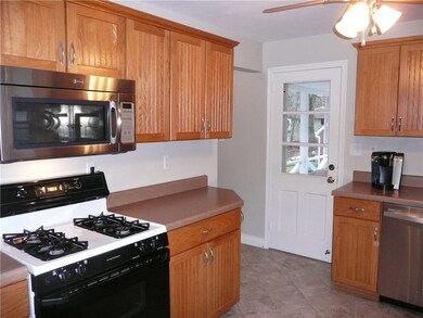 KITCHEN OPENS TO THE SIDE PORCH