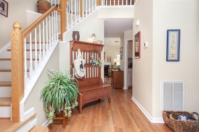 Hardwood floors and large windows throughout this 