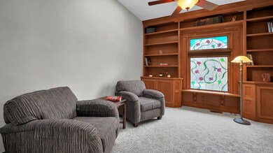 Den with Custom Built Ins