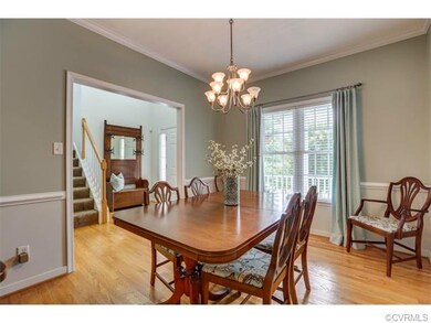 Gorgeous Dining Room with hardwood floors, chair r