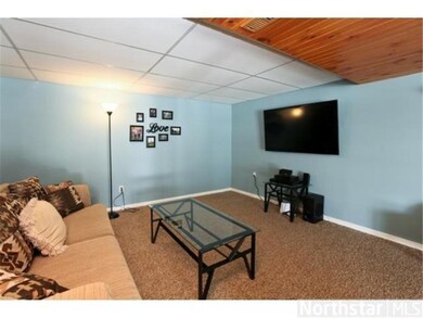 Freshly painted and new carpet in lower level fami
