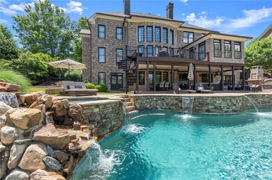 Whether you're relaxing in the hot tub or entertaining poolside, every detail has been curated to create a true outdoor oasis.