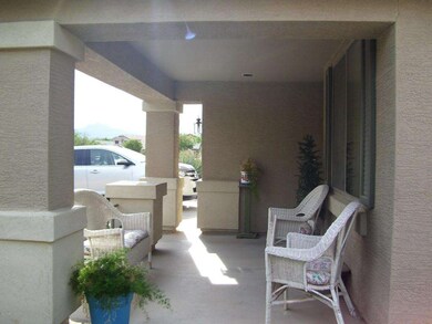 VIEW FROM THE SIDE OF FRONT PORCH.