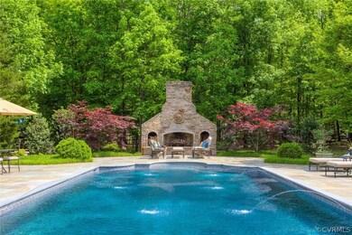 VIEW OF THE HUGE STONE FIREPLACE WITH WOOD BOXES
