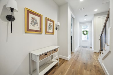 Beautiful entry with white oak engineered wood flo