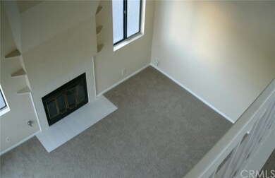 View of Living Area From Loft Railing.