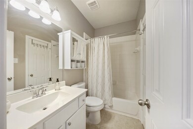 One of the full bathrooms adjoining the bedrooms. Clean and bright.
