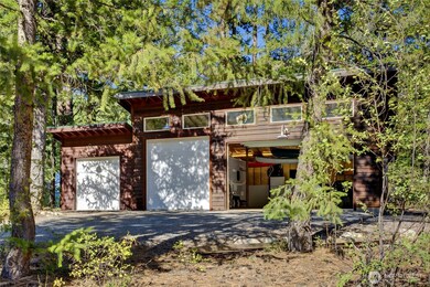 The residential building lot currently features a 1000sf four-bay garage.