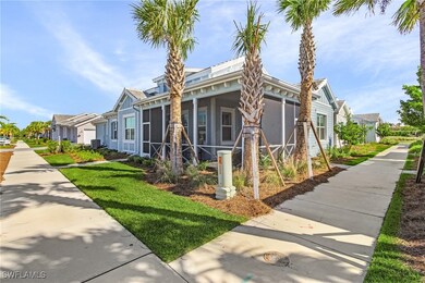 View of front of house with a sunroom and central AC unit