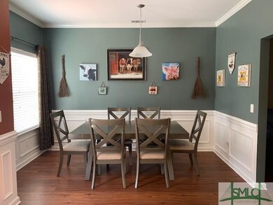 Dining area which has door to Large fenced back ya