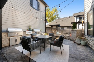 Two grills in the outdoor kitchen plus firepit.