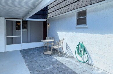 Paver brick patio in the front of the villa 
