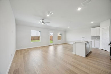 Open Floor Plan in the Hadley home plan by Trophy Signature Homes – REPRESENTATIVE PHOTO