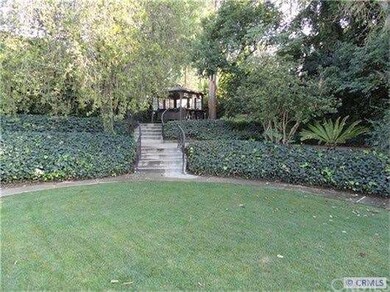 Rear yard features gazebo & spa