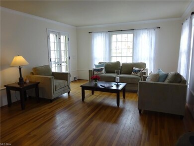 Large, bright living room with lots of natural lig