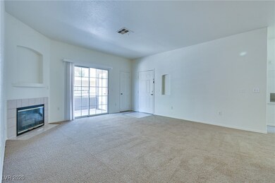 Unfurnished living room featuring carpet floors, a