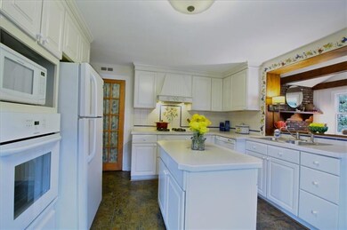 Another view of the charming kitchen that shows th