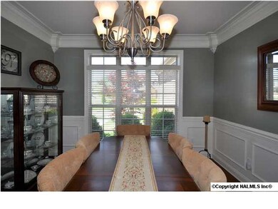 View of the formal dining room from the hall to the kitchen.