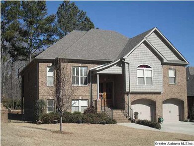 Split foyer with a 2 car front entry garage