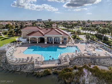 View of pool featuring a hot tub and a patio