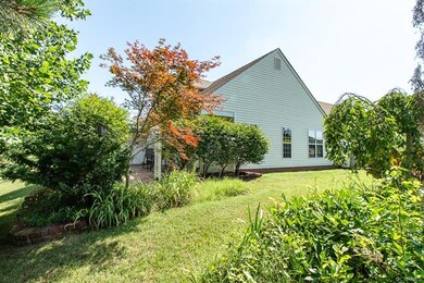 Beautifully landscaped and private back/side yard