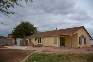 From SW corner of lot looking at house