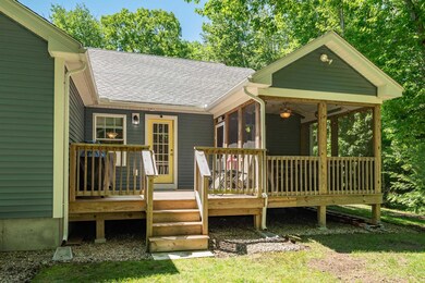 Back deck with screened in porch