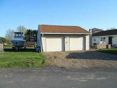 Parking Lot/Garage. ~Nice Sized Two Stall Garage~