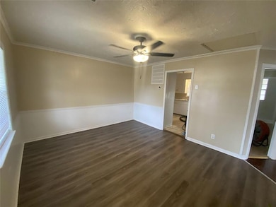 Living room with new subfloor and wood vinyl floor