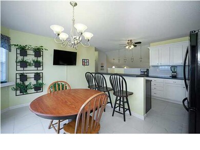 Nice-sized dining area is bayed