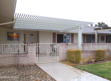 Wonderful front patio with pergola!