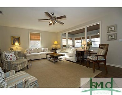 Living Room. Main cottage.  Gorgeous view over sun