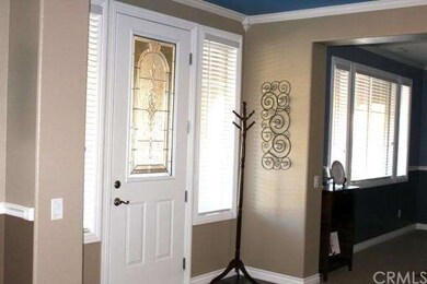 Front entry with beautiful glass door, crown mould