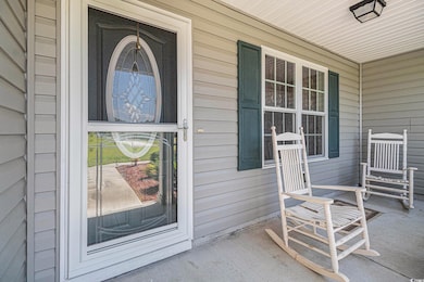 Property entrance with a porch