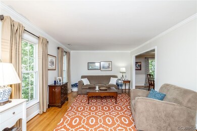 Formal Living Room w Crown moulding & HDWD Floor