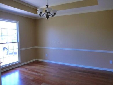 Formal Dining room right off the kitchen with vaul