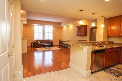 Open, spacious flow between living area with wood