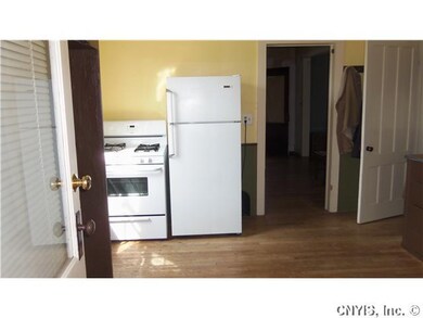 Kitchen. Wood are stretches around to the right.
