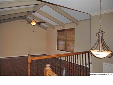 Split foyer living room with new light fixtures an