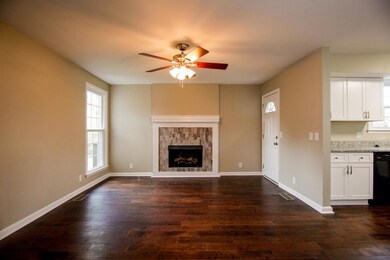Updated fireplace is now the focal point of the home as you enter.  