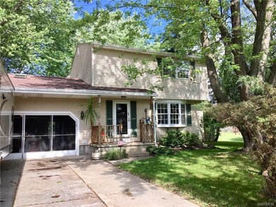 Double wide contrete driveway with open front porc