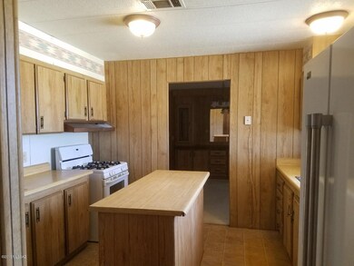 Kitchen looking from laundry room