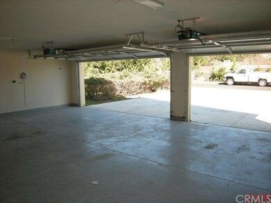 3 Car Garage with epoxy floor and door openers