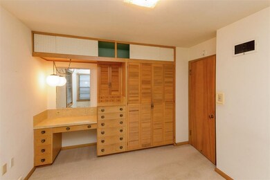 Second bedroom also features custom built in close