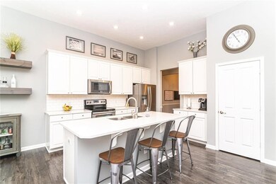 Great kitchen with Quartz counters, center island and breakfast bar!