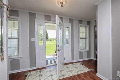 Custom painted and upgraded flooring throughout!