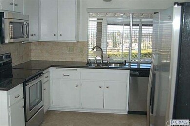 Remodeled kitchen with new appliances.
