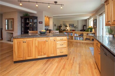 Open concept kitchen looking toward...