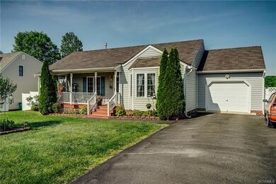 Professionally maintained yard, paved driveway!