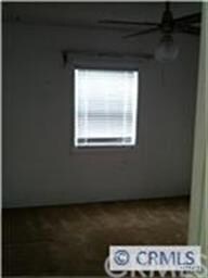Rear bedroom with window.